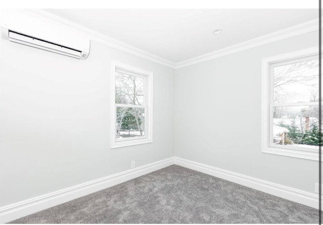 unfurnished room with a wall mounted air conditioner, crown molding, and carpet