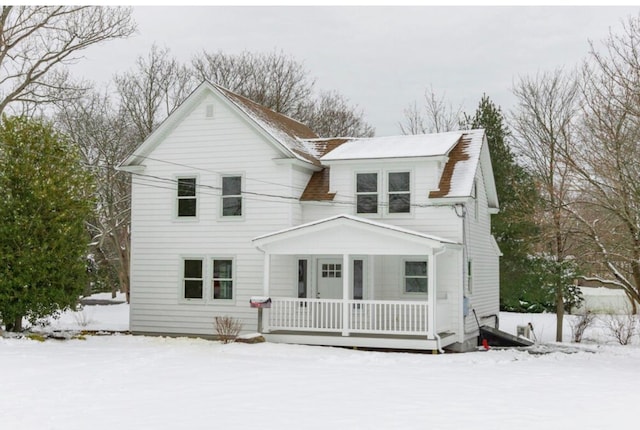 view of front of property featuring covered porch