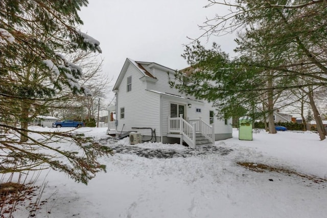 view of snow covered property