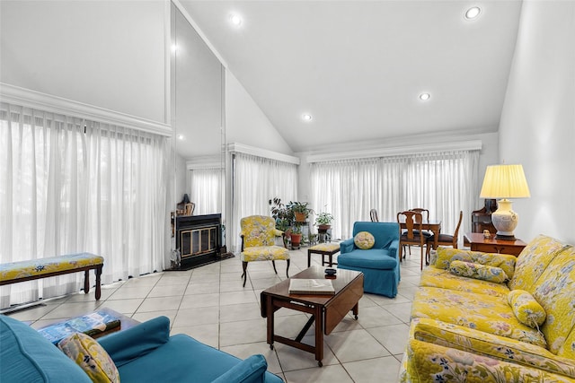 living area featuring light tile patterned floors, high vaulted ceiling, and recessed lighting