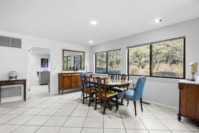 dining space with light tile patterned floors, baseboards, visible vents, and recessed lighting