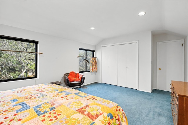 carpeted bedroom with lofted ceiling, baseboards, a closet, and recessed lighting