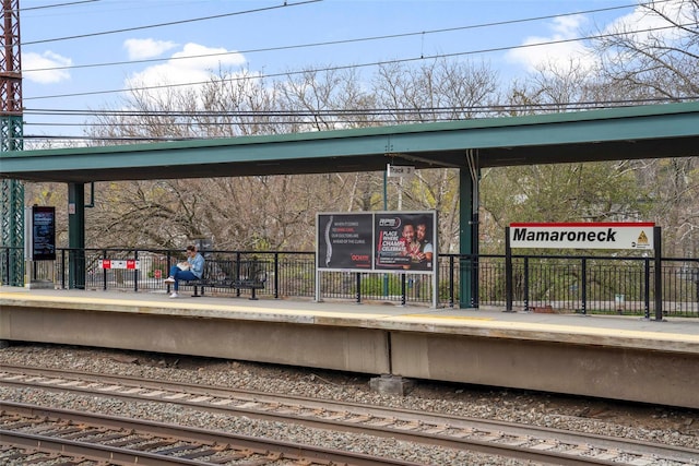 view of community featuring fence