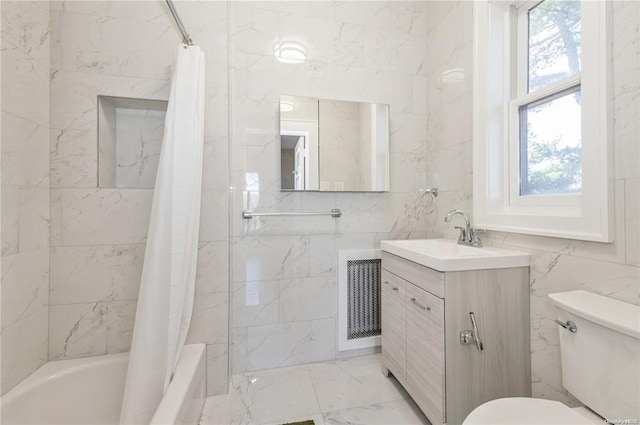 full bathroom with shower / bath combination with curtain, vanity, toilet, and tile walls