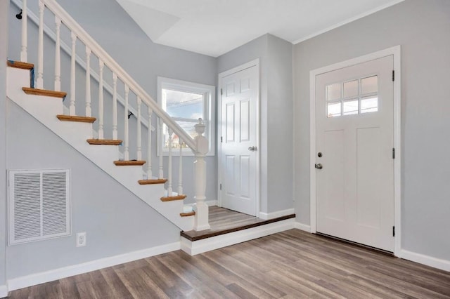 foyer entrance featuring hardwood / wood-style floors