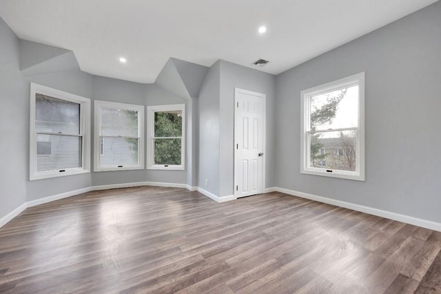 unfurnished room with light hardwood / wood-style flooring