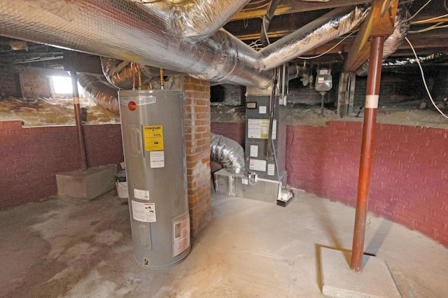 basement featuring brick wall and water heater