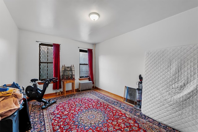 workout room featuring radiator