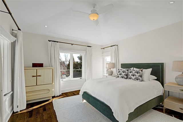 bedroom featuring lofted ceiling, recessed lighting, a ceiling fan, baseboards, and dark wood-style floors