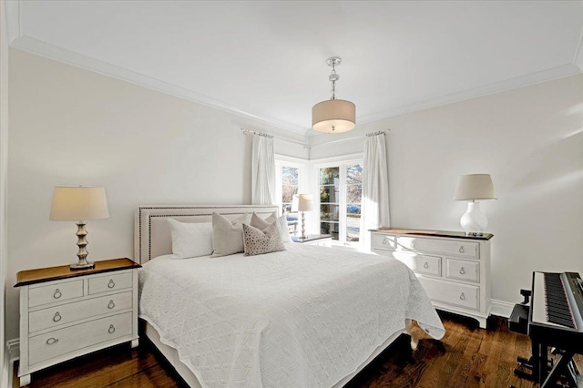 bedroom with baseboards, ornamental molding, and dark wood-type flooring