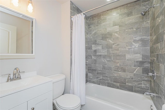 full bathroom featuring shower / tub combo with curtain, vanity, and toilet