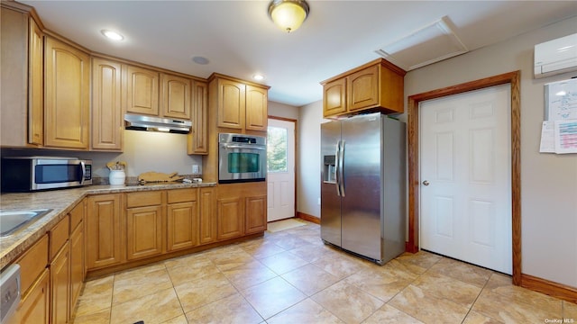 kitchen featuring stainless steel appliances, light tile patterned flooring, light stone countertops, and a wall mounted air conditioner