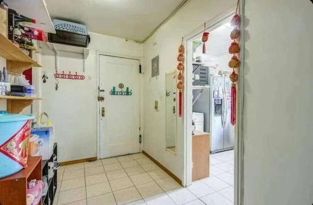 interior space featuring light tile patterned flooring