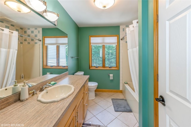 full bathroom with baseboards, toilet, tile patterned floors, shower / bathtub combination with curtain, and vanity