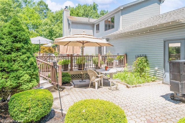 view of patio / terrace with a wooden deck