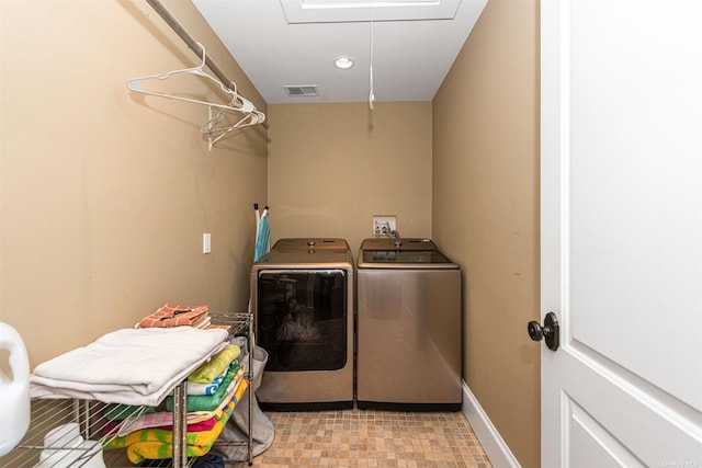 laundry area featuring washer and clothes dryer