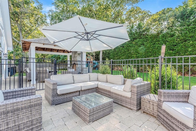 view of patio / terrace featuring an outdoor living space and a playground