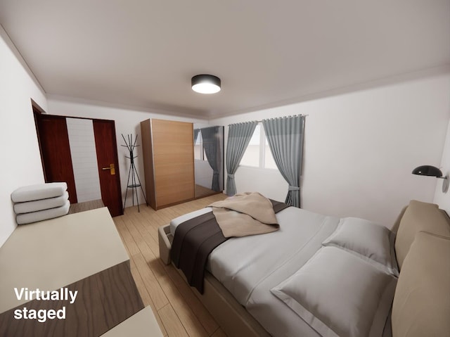 bedroom featuring light hardwood / wood-style floors