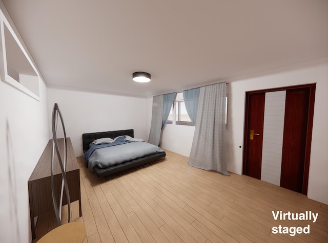 bedroom featuring hardwood / wood-style floors