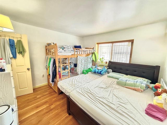 bedroom with light wood-type flooring