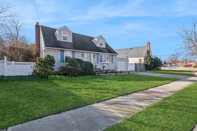 cape cod-style house with a garage and a front yard