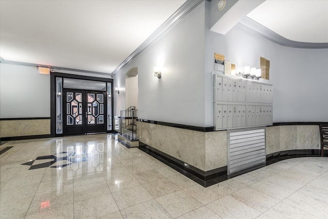 welcome area featuring mail boxes and french doors