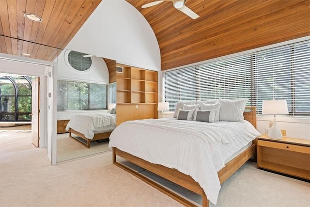 carpeted bedroom featuring ceiling fan, high vaulted ceiling, and wood ceiling