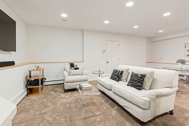 living room with a baseboard radiator and light carpet