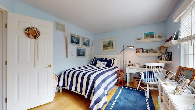 bedroom featuring light hardwood / wood-style flooring