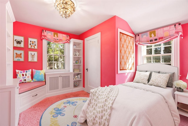 bedroom with light colored carpet