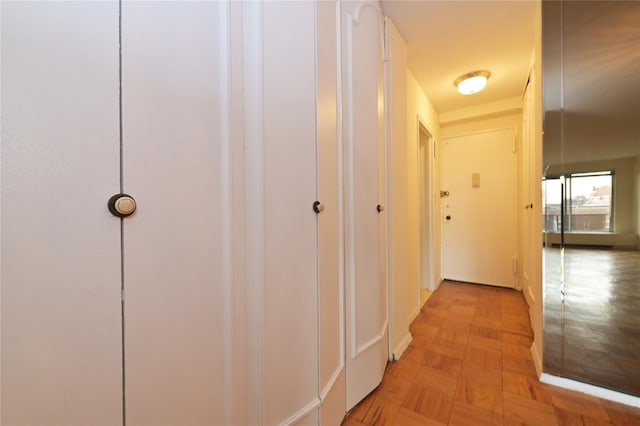 corridor featuring parquet floors