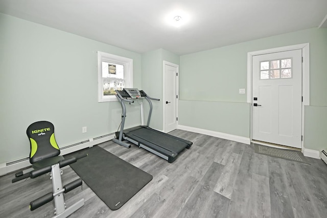 workout room with light wood-type flooring