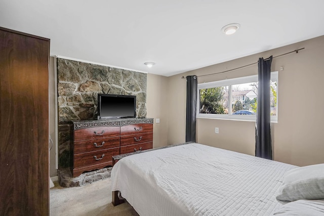 bedroom with light carpet