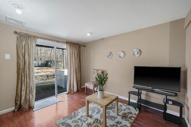 living room featuring dark hardwood / wood-style floors