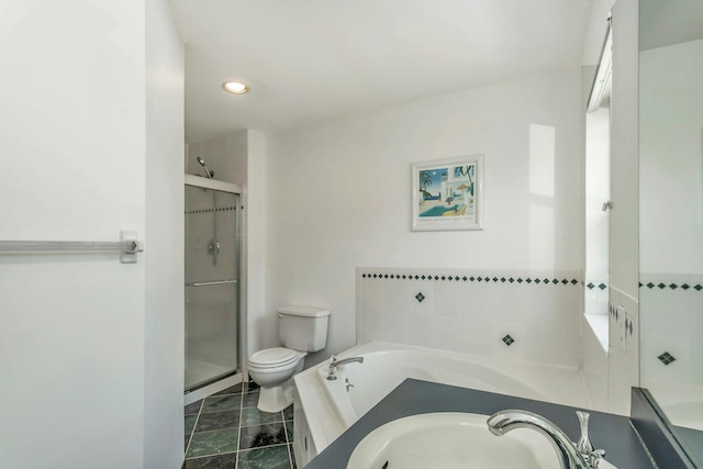 full bathroom featuring tile patterned flooring, plus walk in shower, sink, and toilet