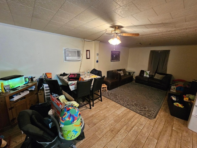 interior space featuring a ceiling fan and light wood-style flooring