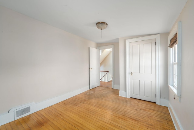 unfurnished bedroom with light hardwood / wood-style floors