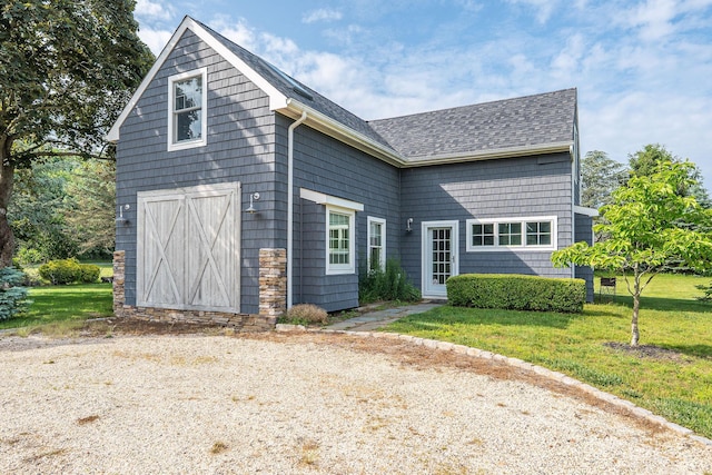 9875 Main Bayview Rd, Southold, NY 11971 - view of front of house featuring a front yard and roof with shingles
