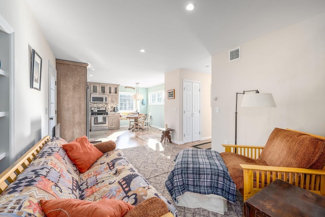 9875 Main Bayview Rd, Southold, NY 11971 - living area featuring recessed lighting and light wood-style floors