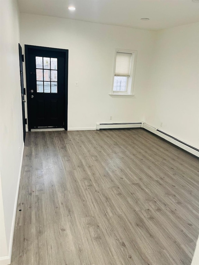 foyer entrance featuring a healthy amount of sunlight and light hardwood / wood-style floors