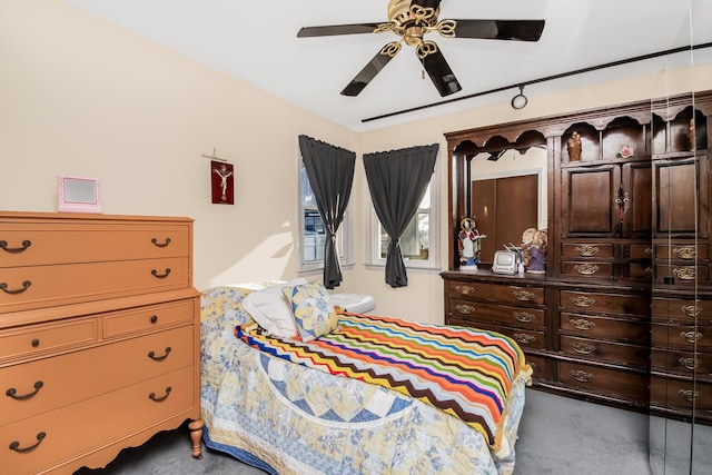 carpeted bedroom featuring ceiling fan