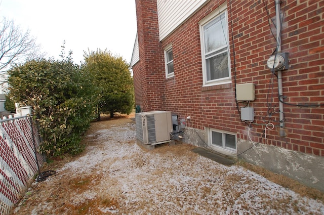 view of property exterior with cooling unit