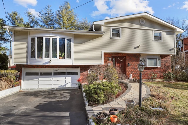 tri-level home featuring a garage