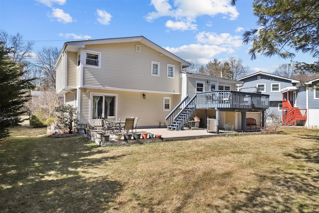 back of house with a patio area, stairway, a yard, and a deck