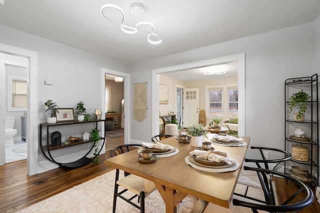 dining room featuring dark wood-type flooring