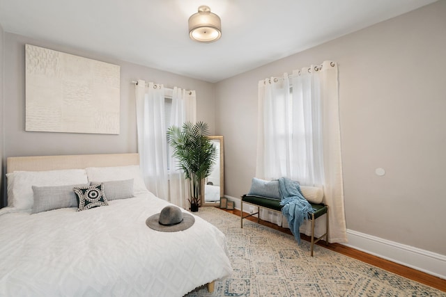 bedroom featuring wood-type flooring