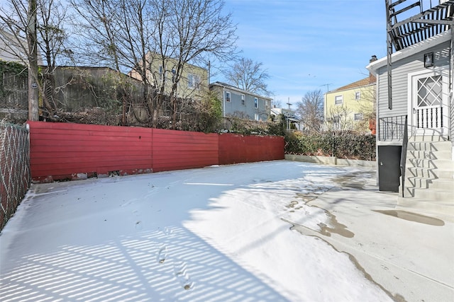 view of yard covered in snow