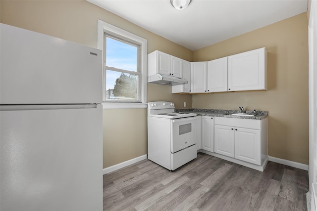 kitchen featuring white cabinetry, sink, white appliances, and light hardwood / wood-style flooring