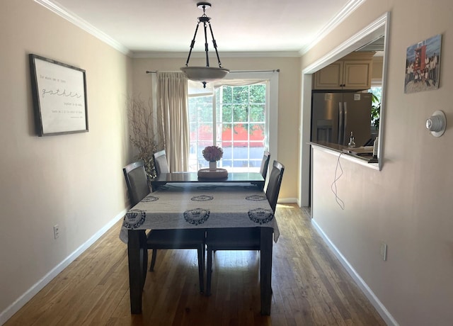 playroom with crown molding and hardwood / wood-style flooring