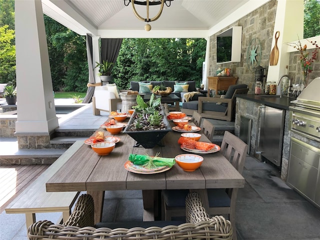 dining room featuring vaulted ceiling